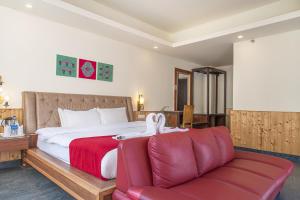 Voodi või voodid majutusasutuse Echor Himalayan Heights Manali toas