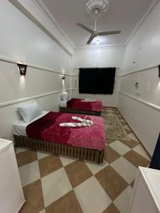 Postel nebo postele na pokoji v ubytování Tara Apartments + 37 fotografií