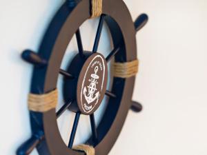 a close up of a blue and brown watch at FeWo Prora - Dünenheide 3.3 in Binz