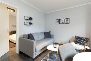 Posezení v ubytování Appartement Merle Kieler Straße 16a APPARTO Grömitz