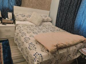 Postel nebo postele na pokoji v ubytování Royal Flat