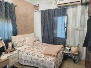 Postel nebo postele na pokoji v ubytování Royal Flat