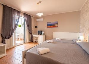 Postel nebo postele na pokoji v ubytování Leuca Relais - Seaside Retreat