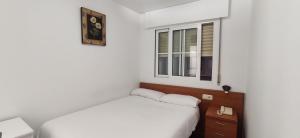 Łóżko lub łóżka w pokoju w obiekcie Hotel Hórreo by Bossh! Hotels