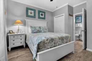 Giường trong phòng chung tại Caribbean Dunes 120 +29 ảnh