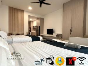TV a/nebo společenská místnost v ubytování MODERN SUITE SUNSURIA Setia Alam At Shah Alam