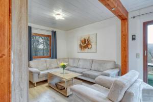 Χώρος καθιστικού στο Ferienhaus Zeta mit Sauna, See, Wald und Ruhe