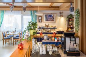 Kavos ir arbatos ruošimo rinkinys apgyvendinimo įstaigoje Hotel Alpha