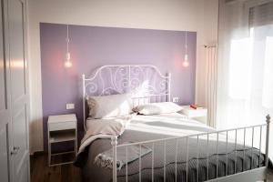 Postel nebo postele na pokoji v ubytování Da Filippo B&B