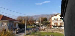 a view of a street in a town with houses at Casa Jalla' - Stanza Marisa in Luserna San Giovanni