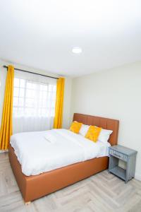 Postel nebo postele na pokoji v ubytování Blink comfort suite- Tiger