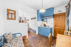 Kuchyň nebo kuchyňský kout v ubytování Apartmány Krumlov
