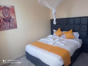 Postel nebo postele na pokoji v ubytování Atlantis BNB