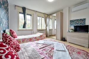 Postel nebo postele na pokoji v ubytování R & R Apartment
