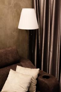 Posezení v ubytování MODERN SUITE SUNSURIA Setia Alam At Shah Alam