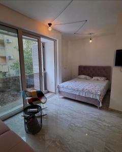 Postel nebo postele na pokoji v ubytování BLACK MOON Apartments