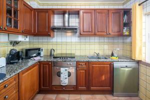 Kuchyň nebo kuchyňský kout v ubytování Casa Bobo