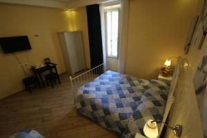 Posteľ alebo postele v izbe v ubytovaní B&B Rome With Love