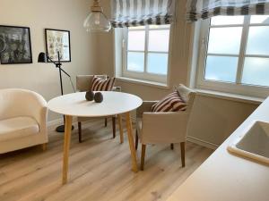 Posezení v ubytování Landhaus am Meer - Whg 5 Hilligenlei