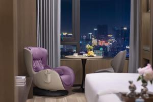 Wenzhou wumajie all-weather hotel shamao river branch - located in the city center pedestrian street with breakfast coffee afternoon tea free laundry drying service free gym free daily necessities free wifi tourist attractions hotel recommendationにあるシーティングエリア