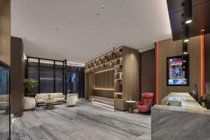 Posezení v ubytování Wenzhou wumajie all-weather hotel shamao river branch - located in the city center pedestrian street with breakfast coffee afternoon tea free laundry drying service free gym free daily necessities free wifi tourist attractions hotel recommendation