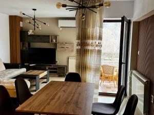 TV a/nebo společenská místnost v ubytování Sunny Park Retreat + 1 fotografie