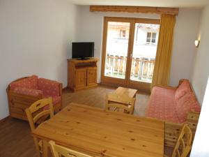 TV o dispositivi per l'intrattenimento presso Wohnung GREPPON NEND200 Ski in and Ski out