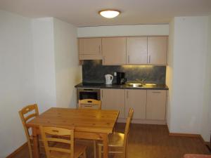 Cucina o angolo cottura di Wohnung GREPPON NEND200 Ski in and Ski out