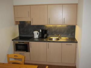 Cucina o angolo cottura di Wohnung GREPPON NEND200 Ski in and Ski out
