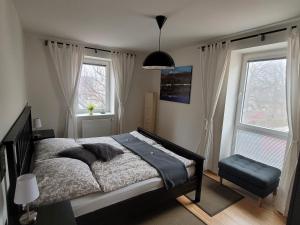 Voodi või voodid majutusasutuse Studios Am Wienerwald toas