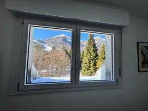 Nespecifikovaný výhled na hory nebo výhled na hory při pohledu z apartmánu