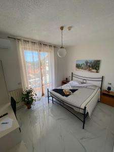 Postel nebo postele na pokoji v ubytování Hotel Belvedere