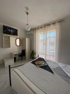 Postel nebo postele na pokoji v ubytování Hotel Belvedere