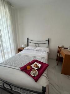 Postel nebo postele na pokoji v ubytování Hotel Belvedere