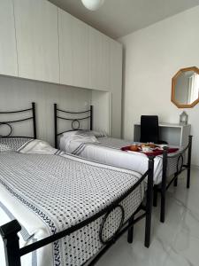 Postel nebo postele na pokoji v ubytování Hotel Belvedere
