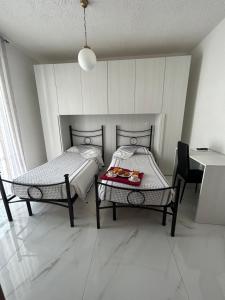 Postel nebo postele na pokoji v ubytování Hotel Belvedere