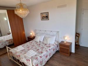 Postel nebo postele na pokoji v ubytování Villa Oliveto