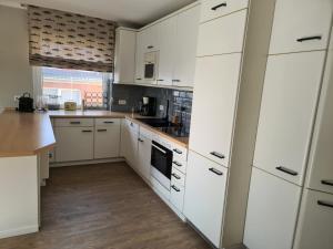 Kuchyň nebo kuchyňský kout v ubytování Loft 22 + 13 fotografií