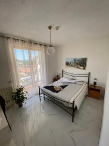 Postel nebo postele na pokoji v ubytování Hotel Belvedere