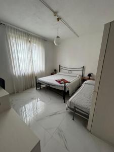 Postel nebo postele na pokoji v ubytování Hotel Belvedere