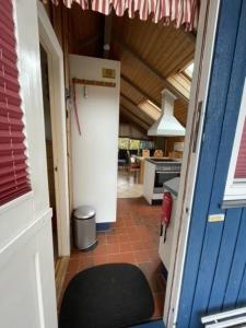 Kuchyň nebo kuchyňský kout v ubytování Ferienhaus "lille blå søster"