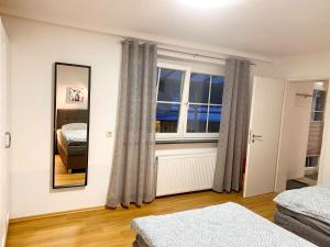 Postel nebo postele na pokoji v ubytování Haus Dora Apartment 2 Penken