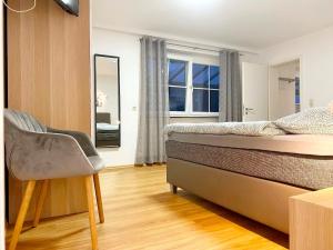 Postel nebo postele na pokoji v ubytování Haus Dora Apartment 2 Penken