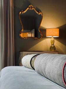 Posteľ alebo postele v izbe v ubytovaní Das REGINA Boutiquehotel
