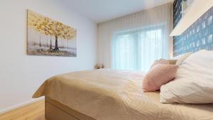 Posteľ alebo postele v izbe v ubytovaní 3D Park Living Apartment
