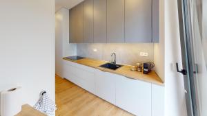 Kuchyňa alebo kuchynka v ubytovaní 3D Park Living Apartment