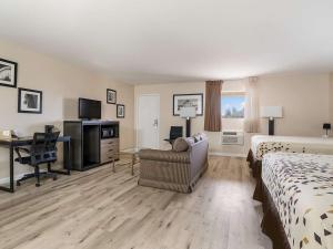 Postel nebo postele na pokoji v ubytování Americas Best Value Inn Refugio
