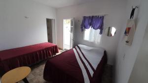 En eller flere senge i et værelse på Casa de Praia em Maceió - Camocim - CE