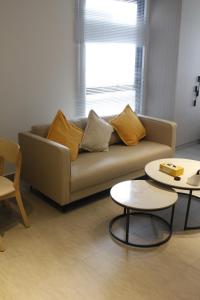 Posezení v ubytování MODERN SUITE SUNSURIA Setia Alam At Shah Alam