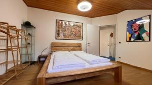 Postel nebo postele na pokoji v ubytování mardolomiti suite